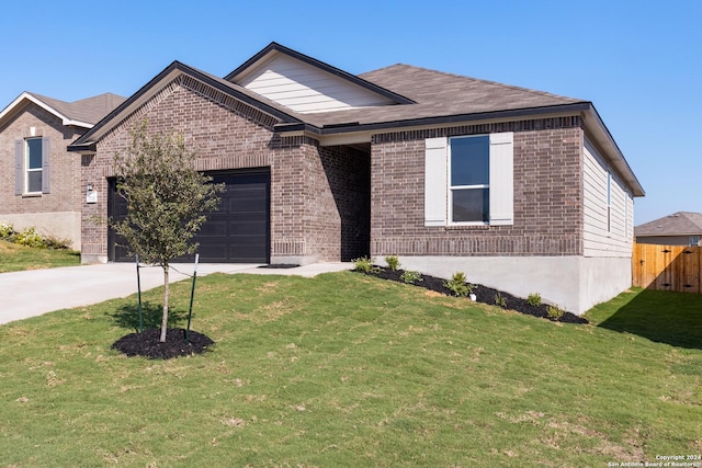 15311 Penelope St, San Antonio, TX 78245 - ranch-style house with brick siding, an attached garage, and concrete driveway