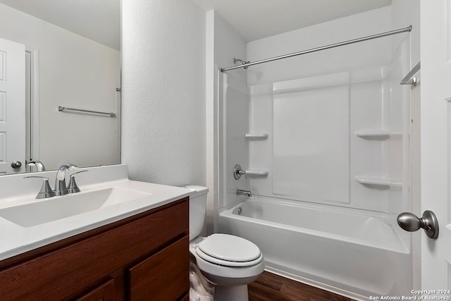 full bathroom with vanity, toilet, shower / bathing tub combination, and hardwood / wood-style flooring