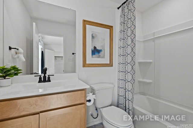 full bathroom featuring shower / bath combo, vanity, and toilet