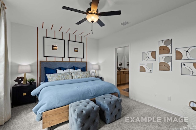 carpeted bedroom with ceiling fan and connected bathroom