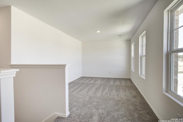 6934 Comanche Cave, San Antonio, TX 78233 - carpeted empty room featuring visible vents, baseboards, a wealth of natural light, and recessed lighting