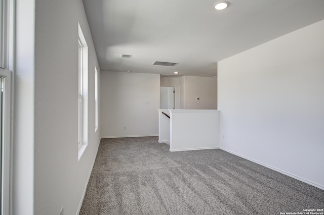 6934 Comanche Cave, San Antonio, TX 78233 - spare room with baseboards, visible vents, recessed lighting, and carpet flooring