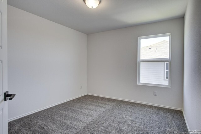 6934 Comanche Cave, San Antonio, TX 78233 - spare room with carpet flooring and baseboards