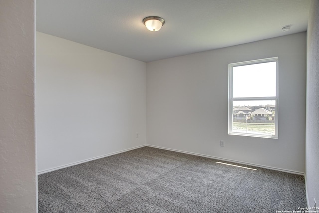 6934 Comanche Cave, San Antonio, TX 78233 - carpeted empty room with baseboards