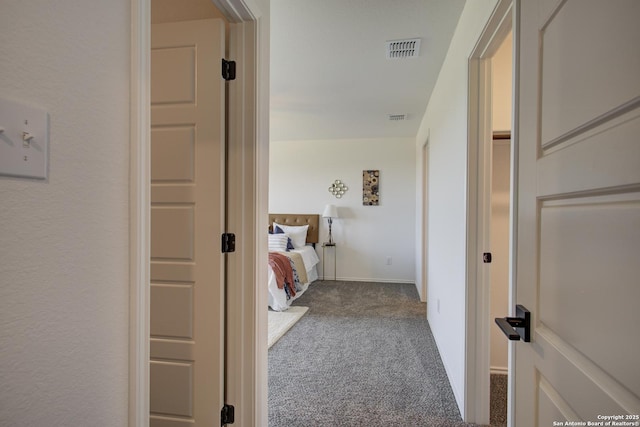 6934 Comanche Cave, San Antonio, TX 78233 - hall with visible vents and dark carpet