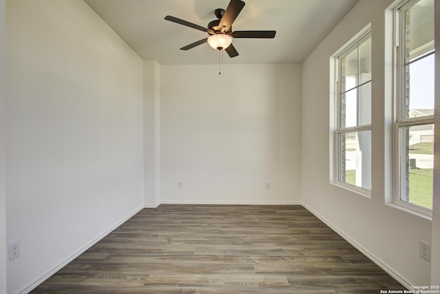 6934 Comanche Cave, San Antonio, TX 78233 - empty room featuring a ceiling fan, baseboards, and dark wood-style flooring