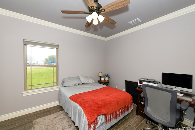 bedroom featuring ceiling fan, dark wood-type flooring, and ornamental molding