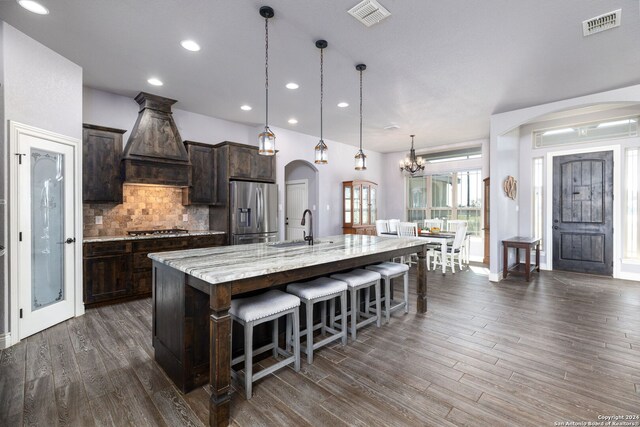 bedroom with dark hardwood / wood-style floors and ceiling fan