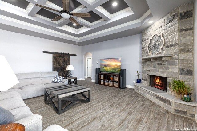 bedroom with beamed ceiling, dark hardwood / wood-style floors, coffered ceiling, and ornamental molding