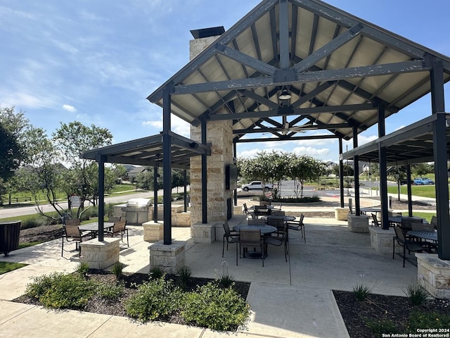 view of community featuring a gazebo and a patio