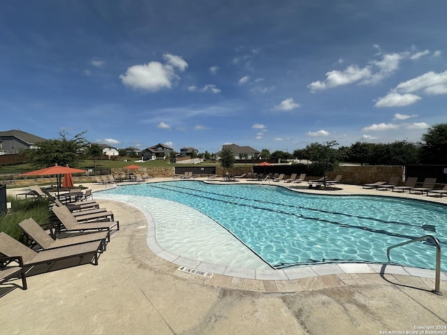 view of pool with a patio area