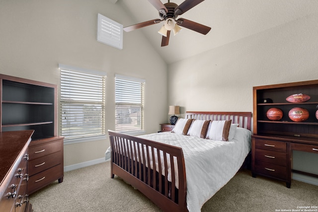 bedroom featuring ceiling fan, light colored carpet, and lofted ceiling