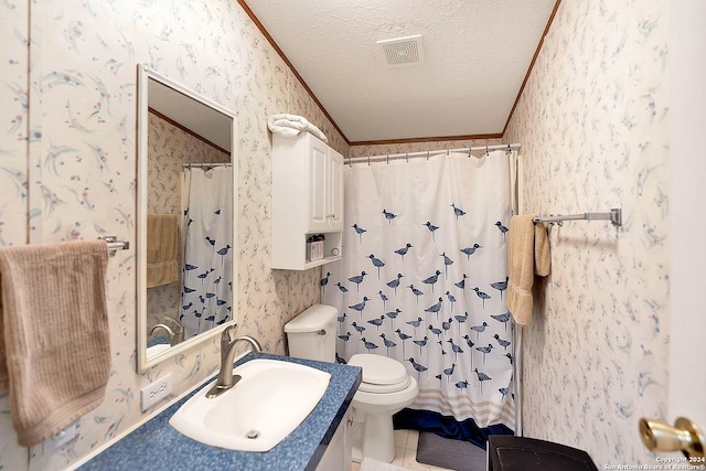 bathroom with vanity, ornamental molding, a textured ceiling, curtained shower, and toilet