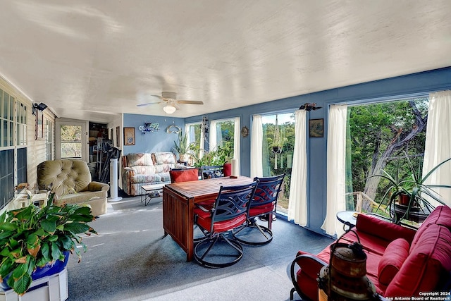 sunroom / solarium with ceiling fan