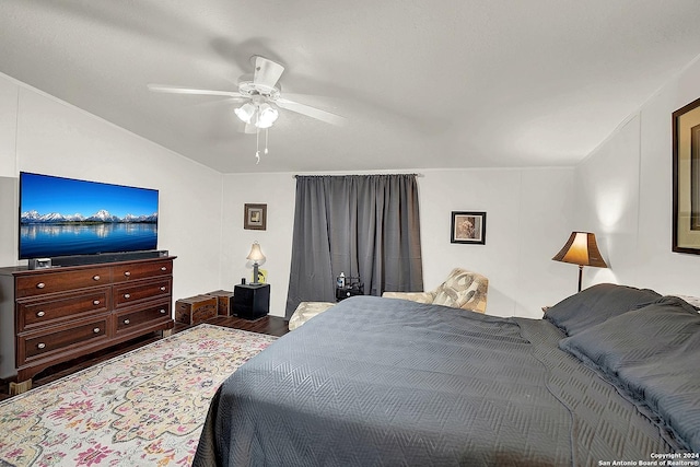 bedroom featuring ceiling fan and hardwood / wood-style floors