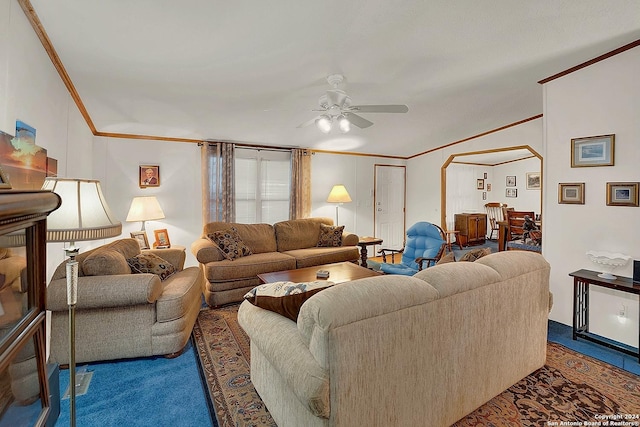 living room with dark colored carpet, crown molding, and ceiling fan