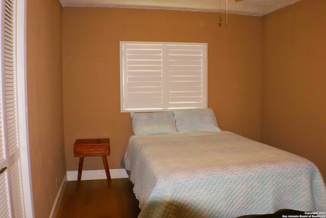 bedroom featuring hardwood / wood-style floors