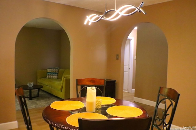 dining area featuring hardwood / wood-style floors