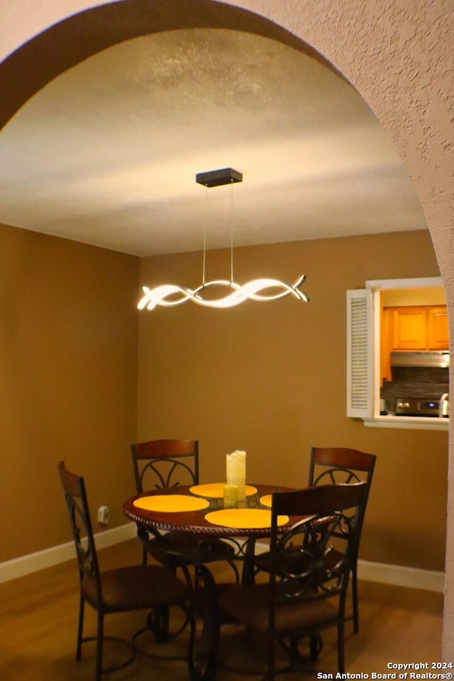 dining area featuring hardwood / wood-style floors