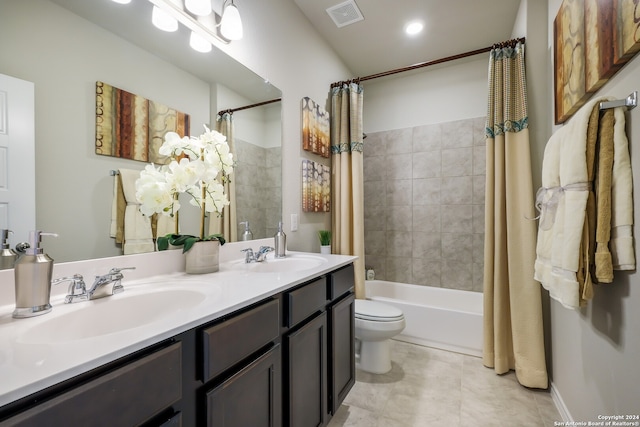 full bathroom with dual vanity, shower / bathtub combination with curtain, toilet, and tile patterned floors