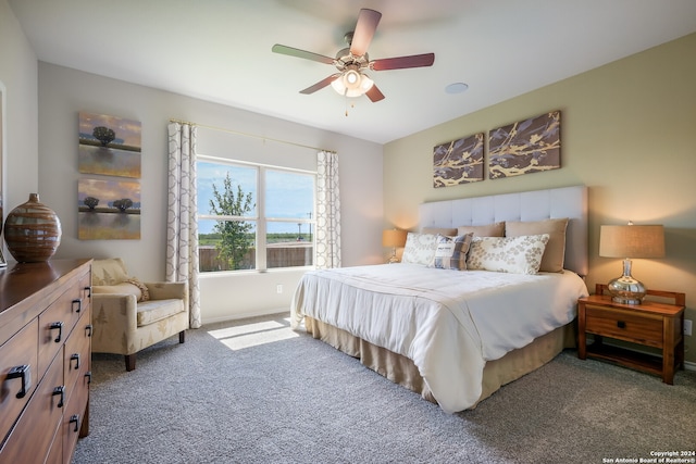 carpeted bedroom featuring ceiling fan