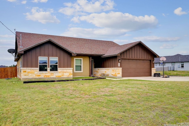 ranch-style home with a garage and a front yard