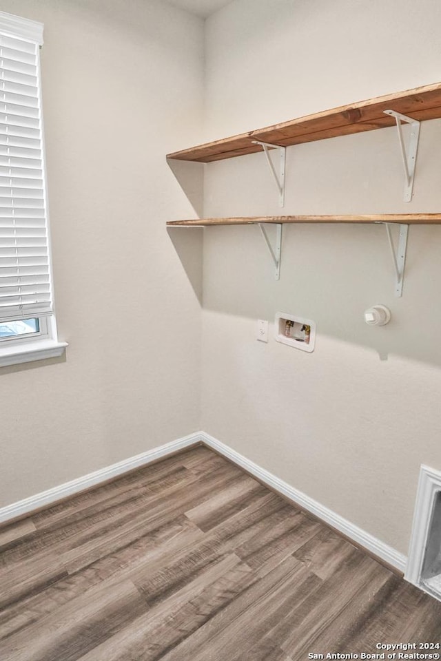 laundry area with hookup for a washing machine and wood-type flooring