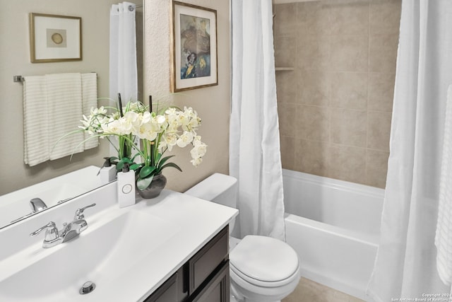 full bathroom featuring shower / bath combination with curtain, toilet, and vanity