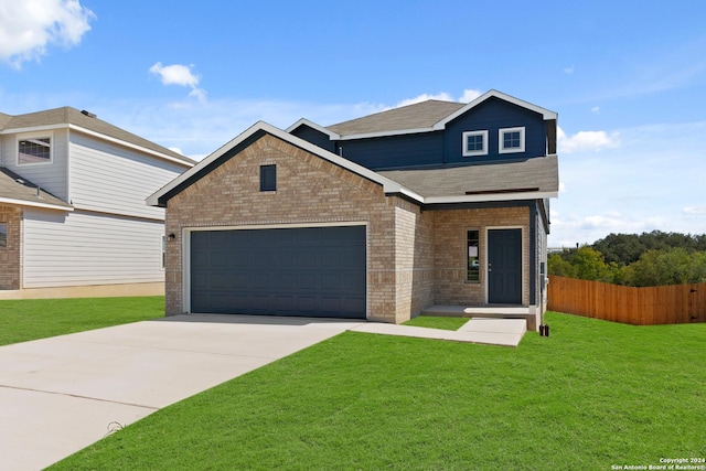 view of front facade featuring brick siding, fence, driveway, and a front lawn