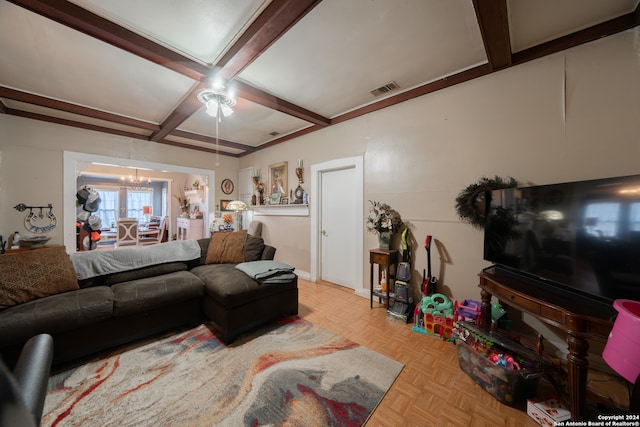 living room with light parquet floors, ceiling fan with notable chandelier, beamed ceiling, and coffered ceiling