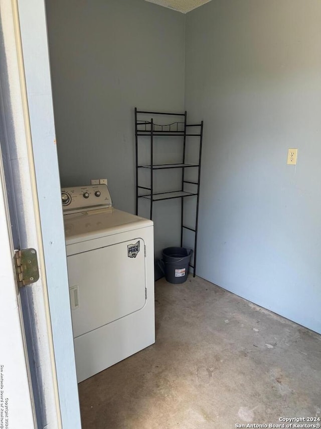 laundry area with washer / dryer