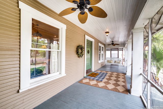 exterior space featuring covered porch and ceiling fan