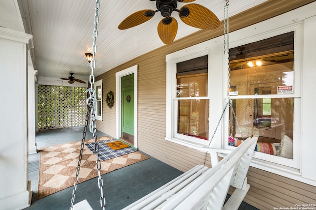 view of patio featuring ceiling fan