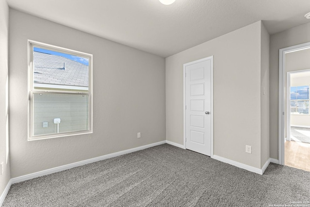 empty room with carpet floors