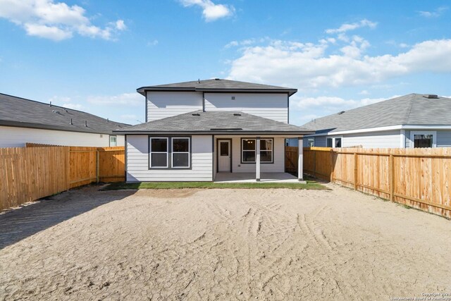 rear view of house with a patio area