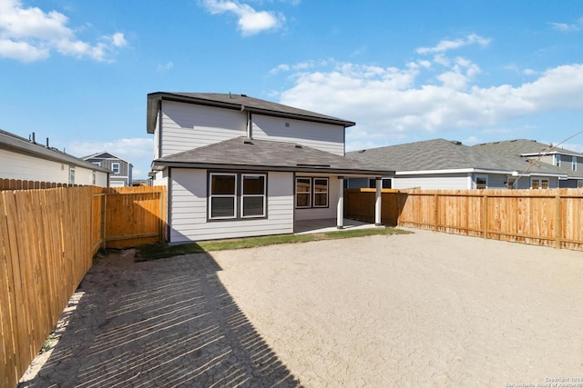 rear view of house featuring a patio area