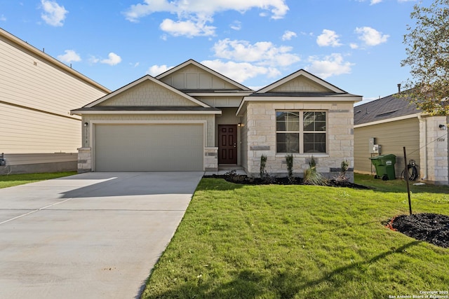 view of front facade with a garage and a front lawn