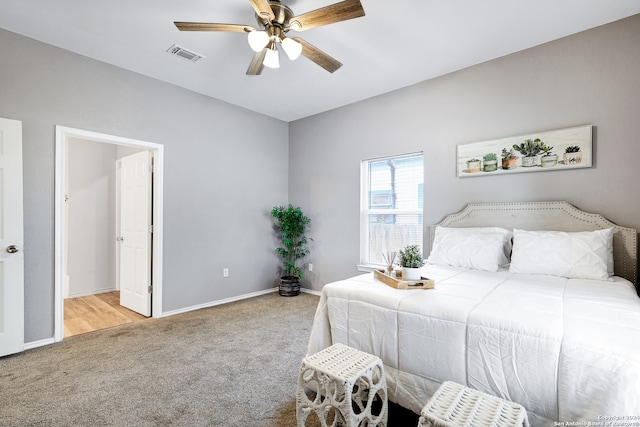 carpeted bedroom featuring ceiling fan