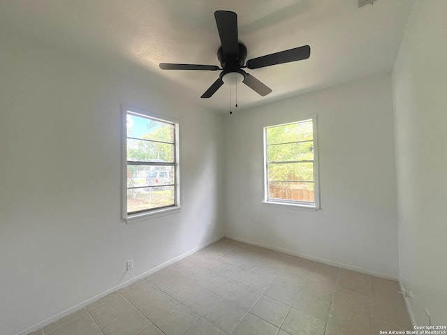 2205 Louise St, Seguin, TX 78155 - empty room featuring baseboards and a ceiling fan