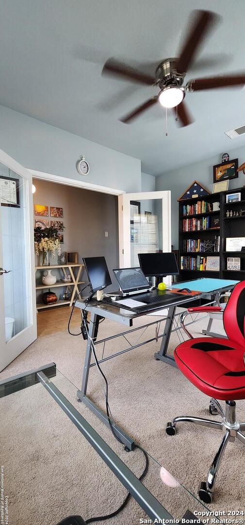 playroom featuring ceiling fan