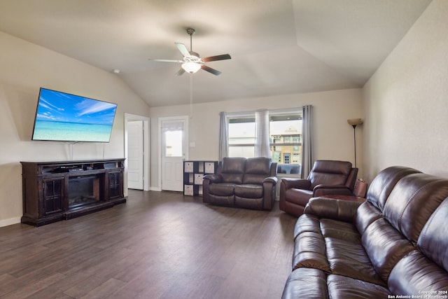 living room with vaulted ceiling, ceiling fan, and dark hardwood / wood-style floors