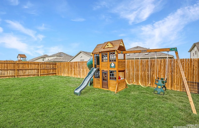 view of play area featuring a lawn