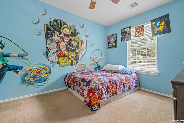 carpeted bedroom with ceiling fan