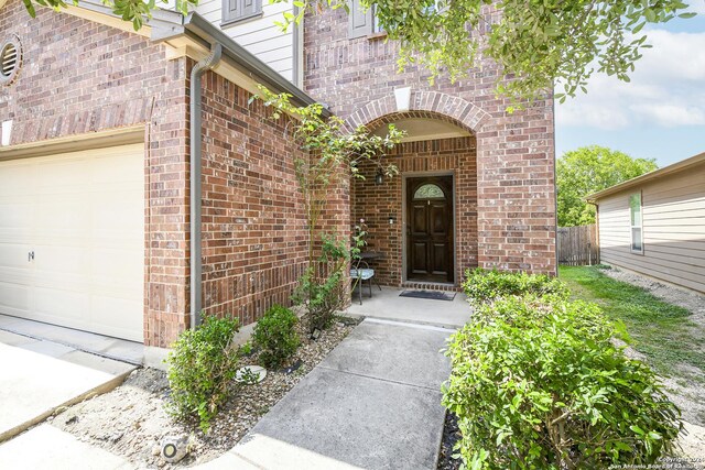 property entrance with a garage