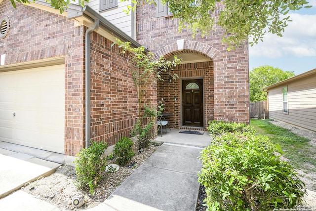 doorway to property featuring a garage