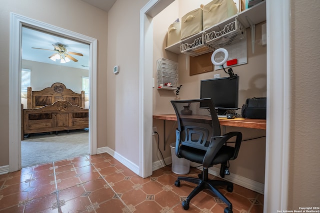 office space with tile patterned floors and ceiling fan