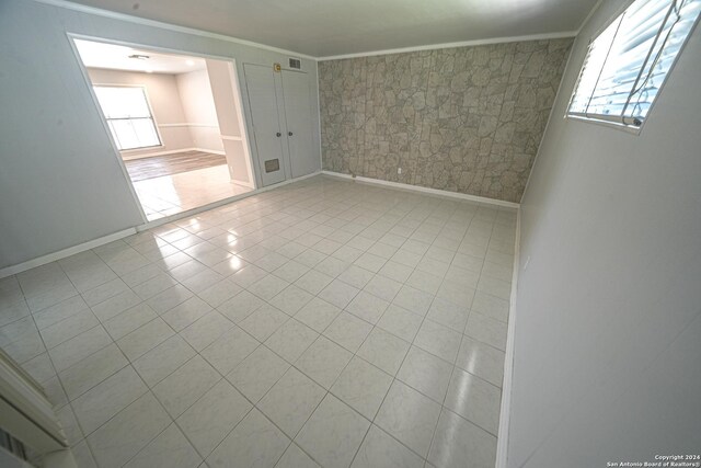 kitchen with white cabinetry, sink, white refrigerator, and light tile patterned floors