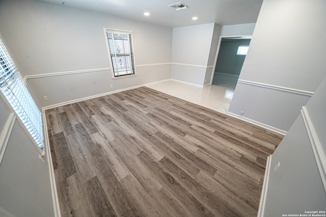 empty room featuring hardwood / wood-style flooring