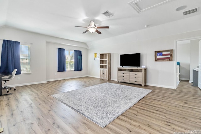 living room with ceiling fan and light wood-type flooring