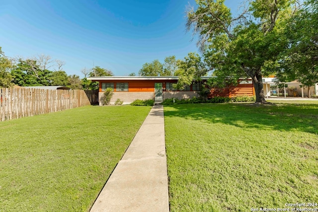 view of front of home with a front yard